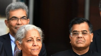 Union Finance Minister Nirmala Sitharaman carrying the tablet leaves from the Ministry of Finance to present and read out the Union Budget 2023 at the Parliament, at North Block, in New Delhi on Wednesday. (ANI Photo) (Rahul Singh)