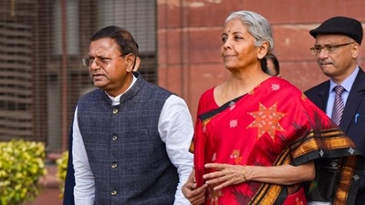 New Delhi: Union Finance Minister Nirmala Sitharaman with Minister of State Pankaj Chaudhary comes out of the Finance Ministry at North Block, in New Delhi, Wednesday, Feb. 1, 2023, ahead of the presentation of the Union Budget 2023-24. Sitharaman will be presenting her fifth Union Budget in Parliament. (PTI Photo/Manvender Vashist Lav)  (PTI02_01_2023_000029A) (PTI)