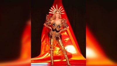 Nora Fatehi's look came together with the headgear, shoulder detailing, tribal-inspired bangles and metallic golden thigh-high boots. (Instagram/@norafatehi) Nora Fatehi's look came together with the headgear, shoulder detailing, tribal-inspired bangles and metallic golden thigh-high boots. (Instagram/@norafatehi)