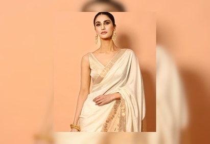 Vaani Kapoor's chanderi silk drape featured golden line borders around the chest and floral prints towards the lower part of the 6 yards. (Instagram/@_vaanikapoor_)