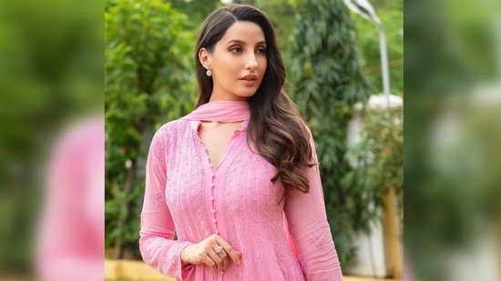 Nora Fatehi's suit features chikankari embroidery work with front-open style. (Instagram/@norafatehi)