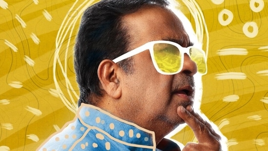 Brahmanandam on the poster for Keeda Cola. 