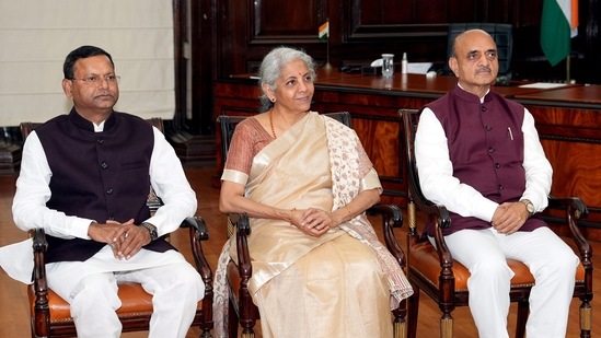 Finance Minister Nirmala Sitharaman with Ministers of State for Finance Bhagwat Karad and Pankaj Chaudhary during the final touches of Union Budget 2023-24, at Finance Ministry in New Delhi,(PTI)