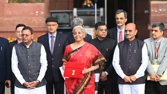 Nirmala Sitharaman chooses a bright red saree with black border and intricate golden work on Budget day.