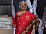 Finance minister Nirmala Sitharaman, who is a Rajya Sabha member from Karnataka, wore Dharwad region's hand-woven 'Ilkal' silk saree with traditional 'Kasuti' work.