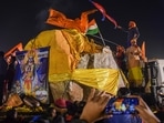 Volunteers and devotees holding Indian and Nepal's flags place the Shaligram stone, coming from Nepal, at Ramsevak Puram in Ayodhya, Wednesday. Volunteers and devotees holding Indian and Nepal's flags place the Shaligram stone, coming from Nepal, at Ramsevak Puram in Ayodhya, Wednesday.