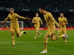 Soccer Football - LaLiga - Real Betis v FC Barcelona - Estadio Benito Villamarin, Seville, Spain - February 1, 2023 FC Barcelona's Robert Lewandowski celebrates scoring their second goal with teammates REUTERS/Marcelo Del Pozo