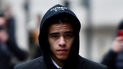 Manchester United's Mason Greenwood leaves the Manchester Magistrates court in Manchester, Britain, November 21, 2022 (REUTERS)