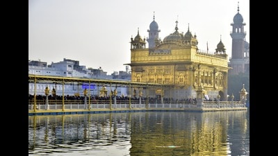 Devotees paying obeisance at the Golden Temple in Amritsar. Devotees paying obeisance at the Golden Temple in Amritsar.