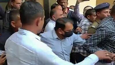 Jaysukh Patel (centre) of Oreva Group after he surrendered before the sessions court in Morbi on January 30. (ANI Photo) Jaysukh Patel (centre) of Oreva Group after he surrendered before the sessions court in Morbi on January 30. (ANI Photo)
