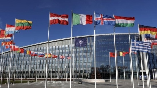 Flags flutter in the wind outside Nato headquarters in Brussels, Belgium. (AP)