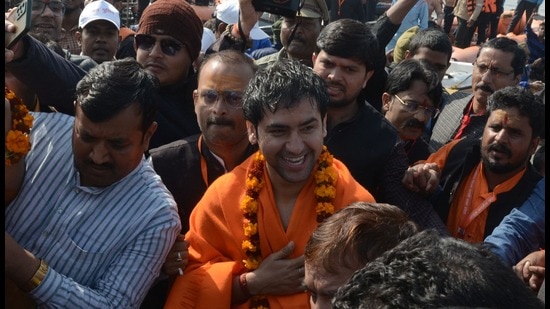 Head of Bageshwar Dham temple located in Chhatarpur district of MP, Dhirendra Krishna Shastri (Bageshwar Sarkar), at Sangam, in Prayagraj, on Thursday (HT Photo)