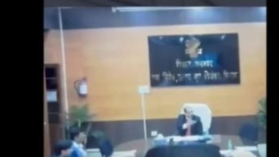 Screenshot from the recording of the viral video of KK Pathak abusing in an official meeting. (ANI)