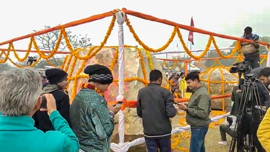 Devotees around the two Shaligram stones in Ayodhya that were dispatched from Nepal.(PTI) Devotees around the two Shaligram stones in Ayodhya that were dispatched from Nepal.(PTI)