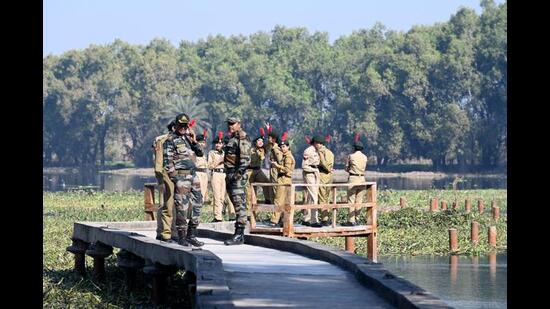 NCC cadets at Surajpur wetland on Thursday. (Sunil Ghosh/HT Photo)