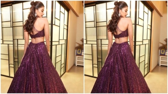Pooja looked gorgeous as ever in the sleeveless purple blouse featuring lace details at the back, and a plunging neckline. In a long flowy purple skirt with purple zari details, she further teamed her blouse. (Instagram/@hegdepooja)