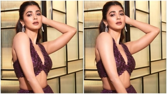 “This sangeet was all about shimmer and shine,” Pooja captioned her post. In statement silver earrings, she accessorised her look for the day. (Instagram/@hegdepooja)