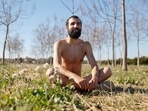 Alejandro Colomar poses naked in his vegetable garden, as Spanish court has ruled in favour of allowing him to continue walking around his village naked, as he has been doing since 2020, in Aldaia, near Valencia, Spain, February 3, 2023. REUTERS/Eva Manez