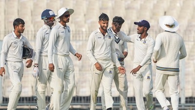 Bengal's bowler Shahbaz Ahmed celebrates with teammates after the wicket of Jharkhand's batter Anukul Roy during the 3rd day of Ranji Trophy quarter-finals cricket match (PTI) Bengal's bowler Shahbaz Ahmed celebrates with teammates after the wicket of Jharkhand's batter Anukul Roy during the 3rd day of Ranji Trophy quarter-finals cricket match (PTI)