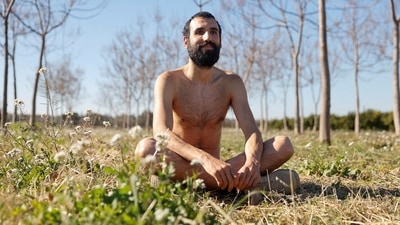 Alejandro Colomar poses naked in his vegetable garden, as Spanish court has ruled in favour of allowing him to continue walking around his village naked, as he has been doing since 2020, in Aldaia, near Valencia, Spain, February 3, 2023. REUTERS/Eva Manez (REUTERS)