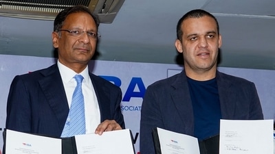 Ajay Singh, President of Boxing Federation of India (left)