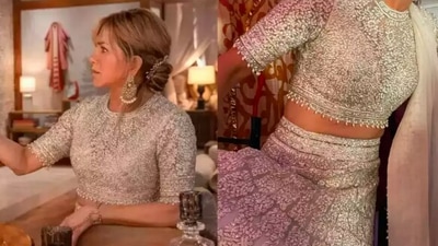 Jennifer Aniston styled her contemporary Indian look with polki jhumkas and a hair accessory. (Screengrab)