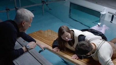 James Cameron performing the stunt in a pool once again. James Cameron performing the stunt in a pool once again.