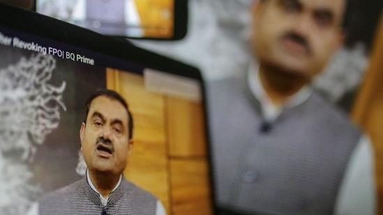 Gautam Adani, chairman of Adani Group, during a video speech on monitors in Mumbai, on Thursday,(Bloomberg)