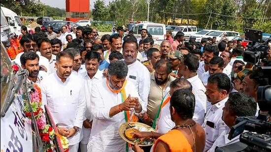 Karnataka Congress president DK Shivakumar participates in the party’s ‘Praja Dhwani Yatra’, in Kolar district on Friday. (PTI)