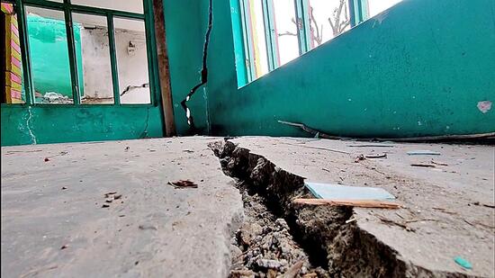 The cracked floor of a house in Doda district. (ANI)