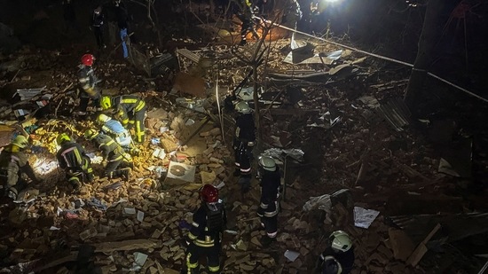 Russia-Ukraine War: Ukrainian firefighters work at a site of an apartment building severely damaged by a Russian missile strike.(Reuters)