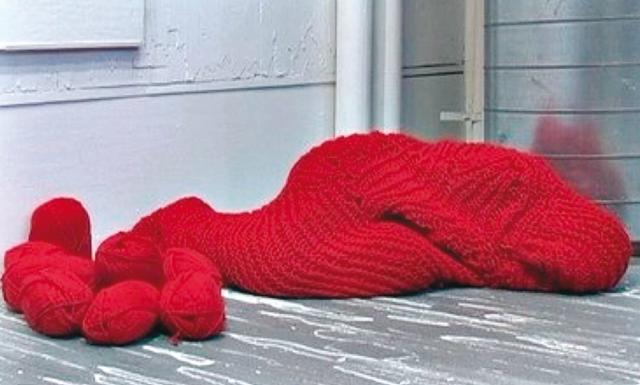 Artist Bea Camacho knit furiously for 11 hours, creating a kind of cocoon that ultimately enveloped and swallowed her up in a video Artist Bea Camacho knit furiously for 11 hours, creating a kind of cocoon that ultimately enveloped and swallowed her up in a video