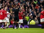Referee Andre Marriner shows a red card to Manchester United's Casemiro, right, during the English Premier League soccer match between Manchester United and Crystal Palace, at the Old Trafford stadium in Manchester, England, Saturday, Feb. 4, 2023. (AP) Referee Andre Marriner shows a red card to Manchester United's Casemiro, right, during the English Premier League soccer match between Manchester United and Crystal Palace, at the Old Trafford stadium in Manchester, England, Saturday, Feb. 4, 2023. (AP)