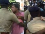 Protestors being detained by Kerala police outside CM Pinarayi Vijayan's Ernakulam guest house. Protestors being detained by Kerala police outside CM Pinarayi Vijayan's Ernakulam guest house.