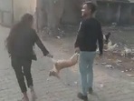A video of a man and a woman being cruel to a puppy has gone viral.(Twitter/ AwanishSharan) A video of a man and a woman being cruel to a puppy has gone viral.(Twitter/ AwanishSharan)