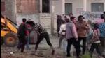 Police personnel and JCB driver came under attack from Jhitarkhedi villagers in Ujjain during an anti-encroachment drive (ANI Photo) Police personnel and JCB driver came under attack from Jhitarkhedi villagers in Ujjain during an anti-encroachment drive (ANI Photo)