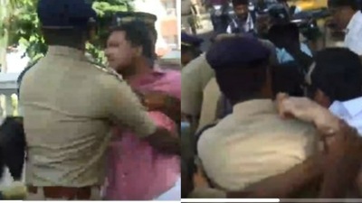 Protestors being detained by Kerala police outside CM Pinarayi Vijayan's Ernakulam guest house. Protestors being detained by Kerala police outside CM Pinarayi Vijayan's Ernakulam guest house.