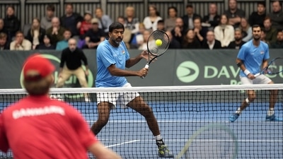 Rohan Bopanna, center, and Yuki Bhambri, right, of India in action during the Davis Cup double tennis match between Johannes Ingildsen and Holger Rune of Denmark against Yuki Bhambri and Rohan Bopanna of India, in Hilleroed, Denmark, Saturday, Feb. 4, 2023. (AP) Rohan Bopanna, center, and Yuki Bhambri, right, of India in action during the Davis Cup double tennis match between Johannes Ingildsen and Holger Rune of Denmark against Yuki Bhambri and Rohan Bopanna of India, in Hilleroed, Denmark, Saturday, Feb. 4, 2023. (AP)