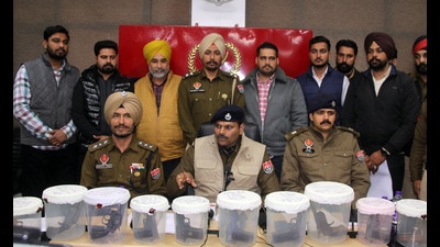 Police officials interacting with media person during a press conference at district administration complex in Bathinda on Saturday.(Photo by Sanjeev Kumar/Hindustan Times)