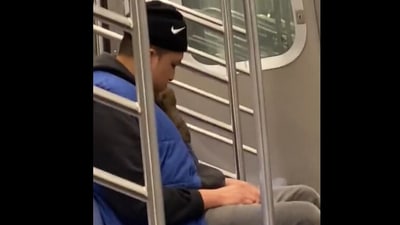 Rat climbs on a passenger in a metro. (Twitter/@Jazzie654) Rat climbs on a passenger in a metro. (Twitter/@Jazzie654)