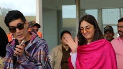 Manish Malhotra with Kiara Advani at Jaisalmer airport. Manish Malhotra with Kiara Advani at Jaisalmer airport.