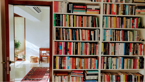 Varying widths in floor-to-ceiling bookshelves.