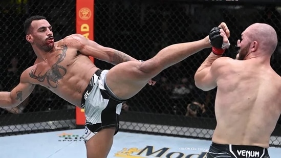Devin Clark in action against Ion Cutelaba (UFC)