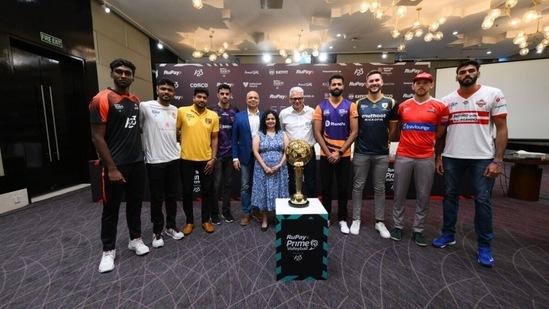 All eight teams' captains along with Mr. Joy Bhattacharjya, Mr. Tuhin Mishra, and Ms. Lalita Nayak, In-Charge Marketing, NPCI. (PVL)