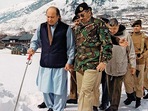 A 1999 file photo of then Pakistan Prime Minister Nawaz Sharif and then Army Chief Gen Pervez Musharraf at LoC.. A 1999 file photo of then Pakistan Prime Minister Nawaz Sharif and then Army Chief Gen Pervez Musharraf at LoC..