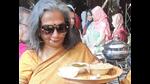 A foodie with her choice of thal at the Home Cook food estival of Sanatkada (Deep Saxena) A foodie with her choice of thal at the Home Cook food estival of Sanatkada (Deep Saxena)