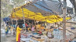 In July last year, the market building was demolished amid heavy rains on the grounds that it was an ‘unsafe’ structure — in the C-1 category of dilapidated buildings. Since then, the vendors have been forced out onto into an open area next to the demolition site. As a sign of protest, the vendors have erected some temporary structures at their own expense and have shunned the use of a common shed provided by the BMC as an alternative. (Satish Bate/HT PHOTO) In July last year, the market building was demolished amid heavy rains on the grounds that it was an ‘unsafe’ structure — in the C-1 category of dilapidated buildings. Since then, the vendors have been forced out onto into an open area next to the demolition site. As a sign of protest, the vendors have erected some temporary structures at their own expense and have shunned the use of a common shed provided by the BMC as an alternative. (Satish Bate/HT PHOTO)