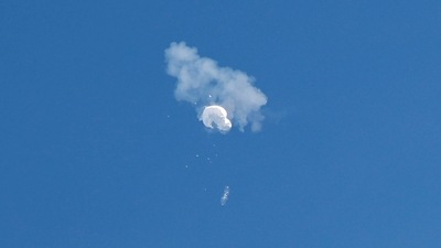 The suspected Chinese spy balloon drifts to the ocean after being shot down off the coast in Surfside Beach, South Carolina, U.S. Saturday. (REUTERS)