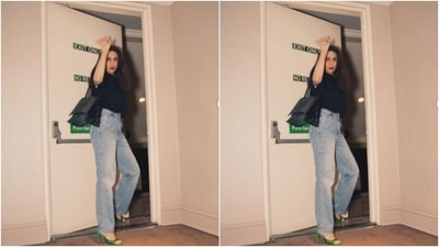 Karisma tucked her oversized black T-shirt into her jeans, and carried a black leather sling bag, as she posed for the cameras. (Instagram/@therealkarismakapoor) Karisma tucked her oversized black T-shirt into her jeans, and carried a black leather sling bag, as she posed for the cameras. (Instagram/@therealkarismakapoor)