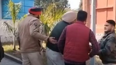 Screengrab of the alleged incident showing the ASI being taken away by other officials. (Twitter/@Gagan4344)